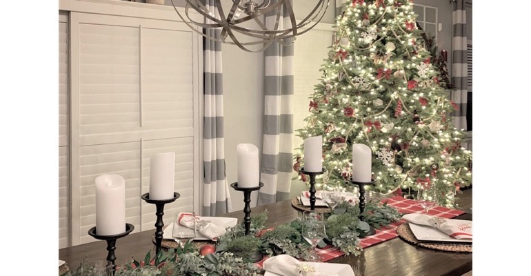 Holiday spread in festive dining room. 